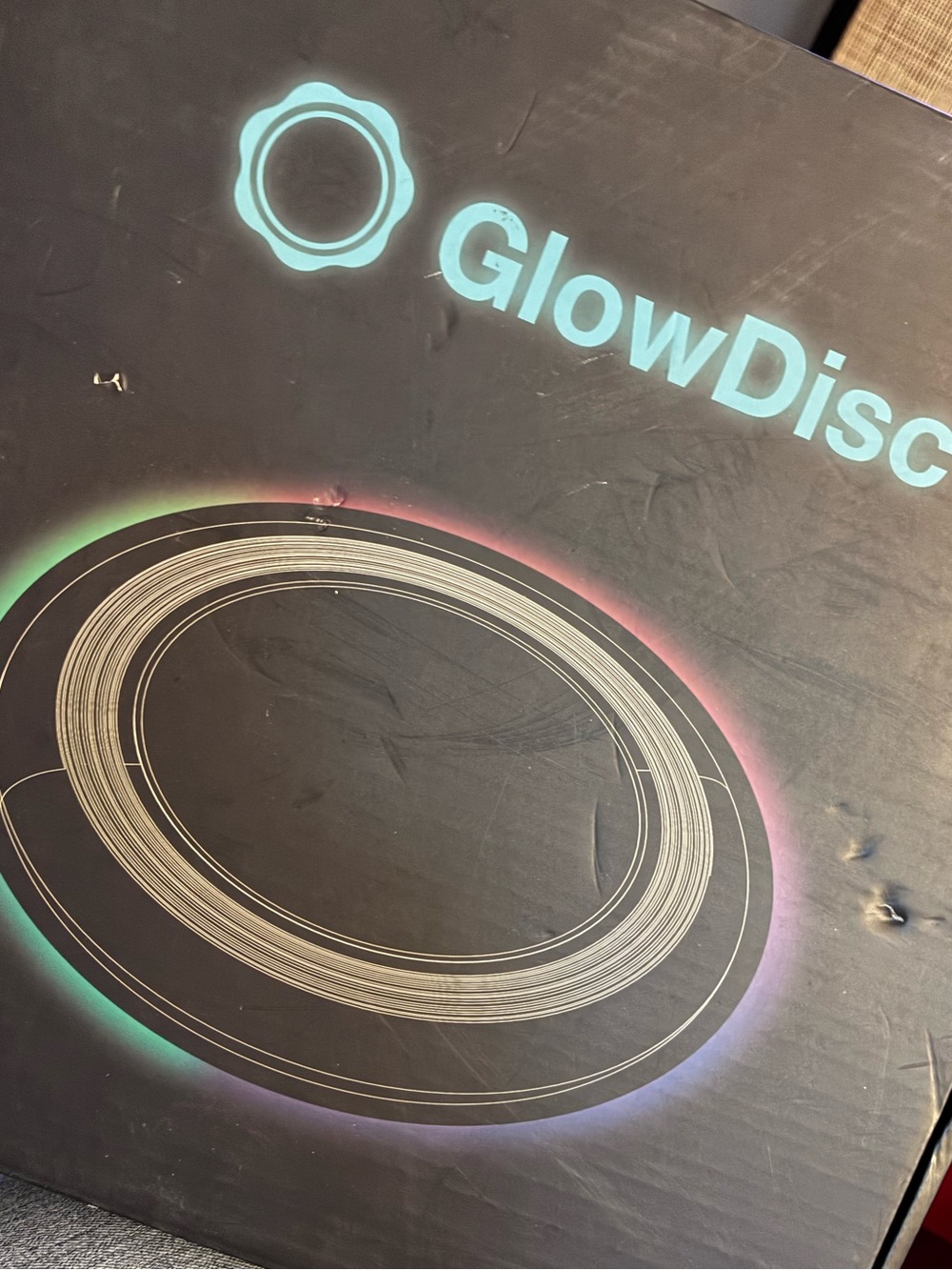 GlowDisc LED Light-Up Flying Disc - Black with Rainbow Glow